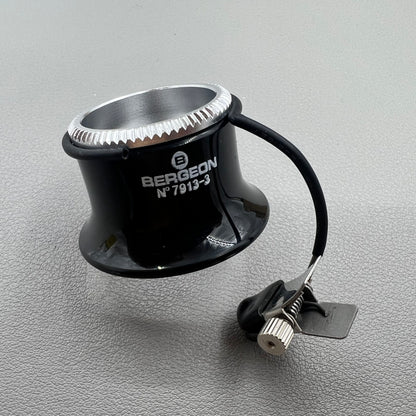 Swiss Bergeon 7913 3.3x magnifying eyeglass clip for precise watch accessory repairs and adjustments.