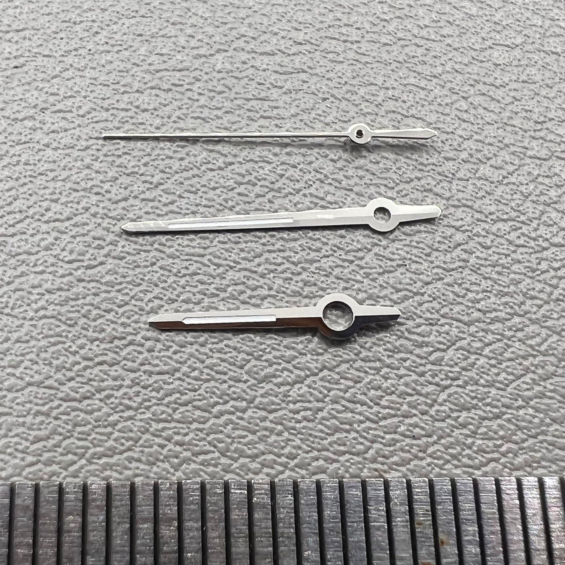 Silver trim watch hands with green luminous tips for ETA 2892, 2846, 2836, 2824 movements.