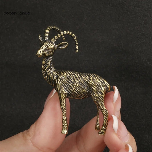 Solid copper goat trinket, vintage hand-carved bronze figurine for watch accessory display.