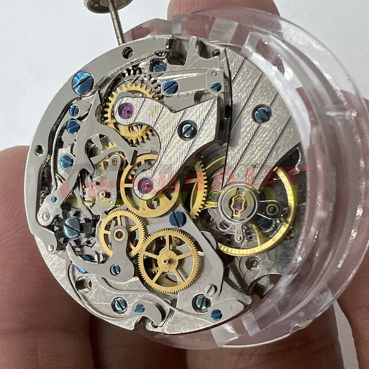 Tianjin Seagull ST1908 watch movement with moon phase, manual winding for accurate timekeeping.