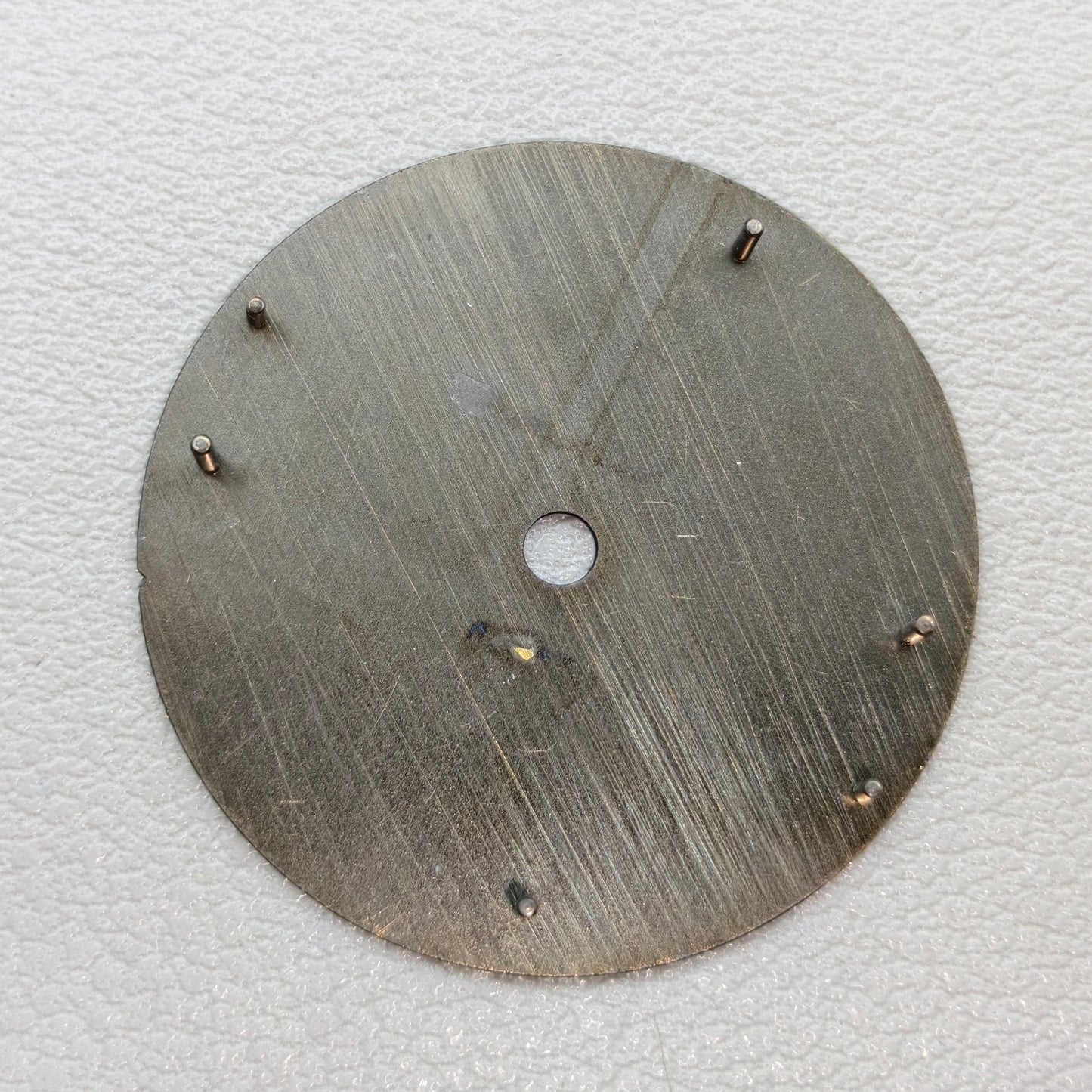 watch dial with R logo