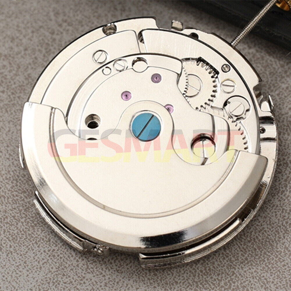 Dandong Silver automatic watch with moon phase and date display, elegant Asian design for stylish wear.