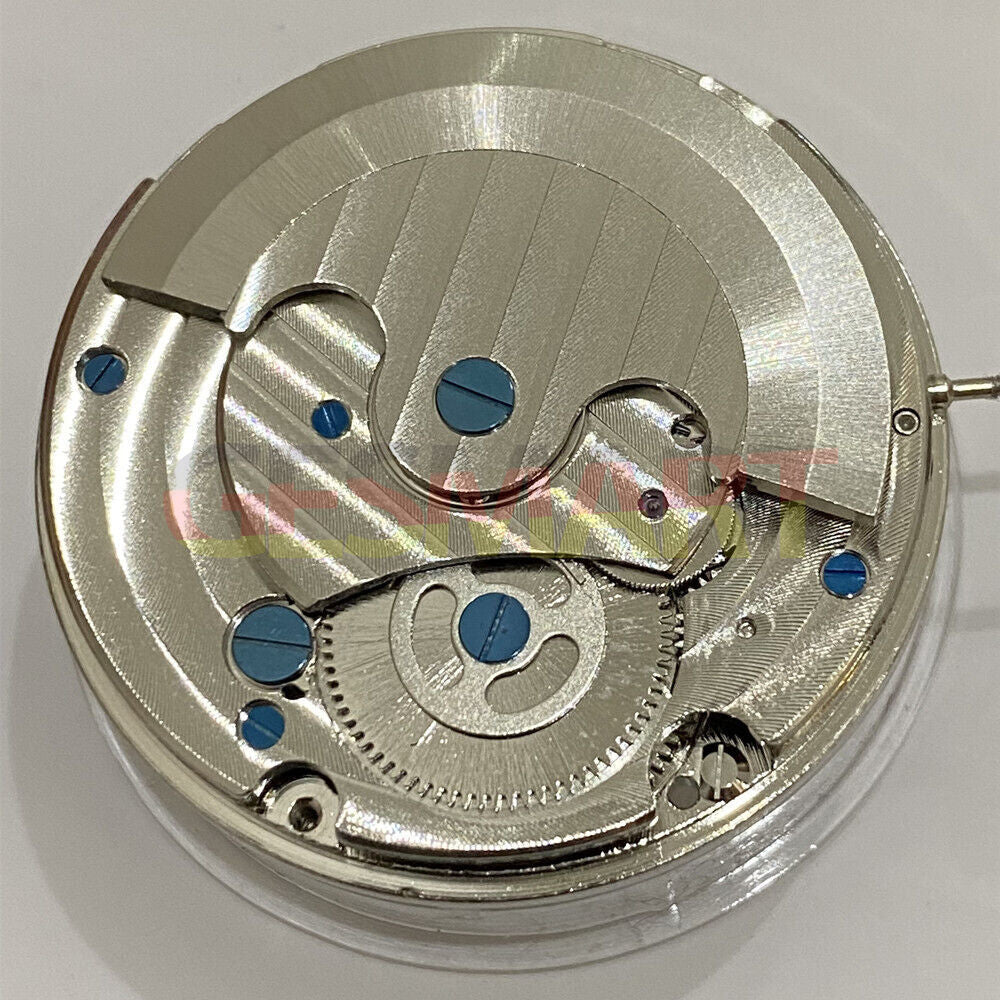 Multifunctional mechanical watch featuring dual time zones and moon phase at 3 o'clock.