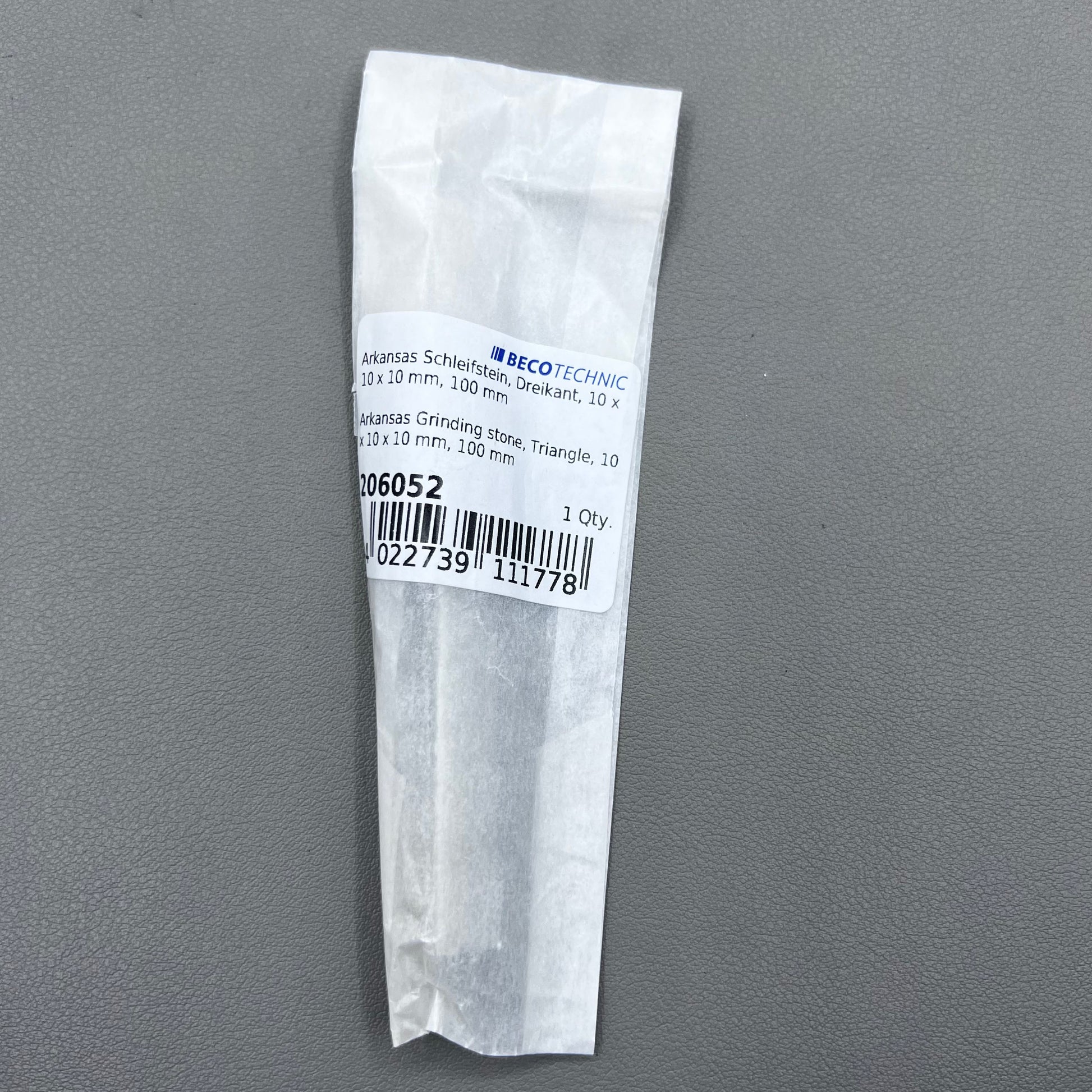 Horotec MSA16.013 Arkansas triangular sharpening stone for precise watch tool maintenance and polishing.