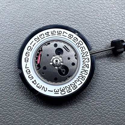 Swiss ETA 804.112 quartz watch movement showing precise 3 hands mechanism for accurate timekeeping.