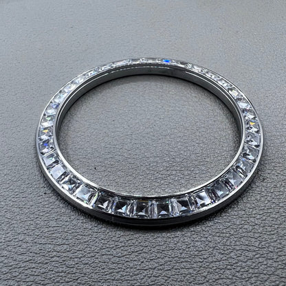 Silver 39.4mm Daytona watch bezel with T-shaped square diamond moissanite, flat bottom design.