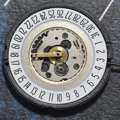 HCP2 watch part with Swiss ETA805.114 quartz movement, 3 hands, and date at 6, for precise timekeeping.