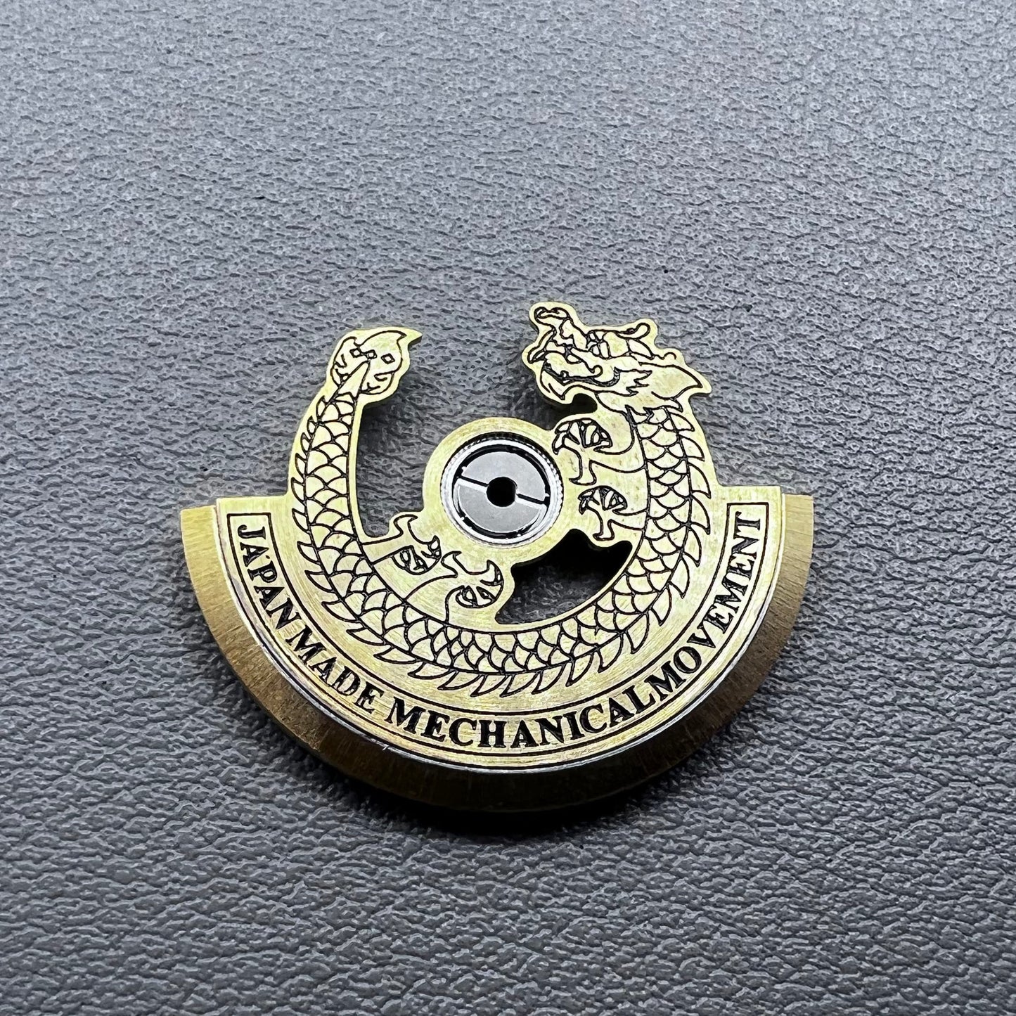 Black carved golden dragon rotor for NH35 NH36 watch movement, enhancing mechanical elegance.