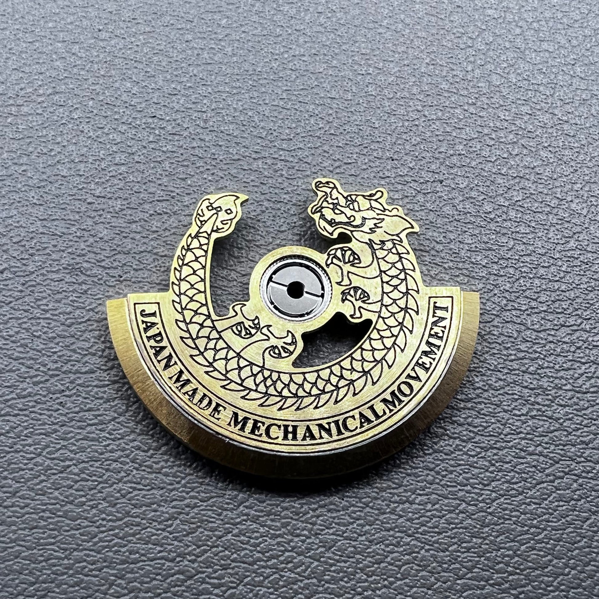 Black carved golden dragon rotor for NH35 NH36 watch movement, enhancing mechanical elegance.