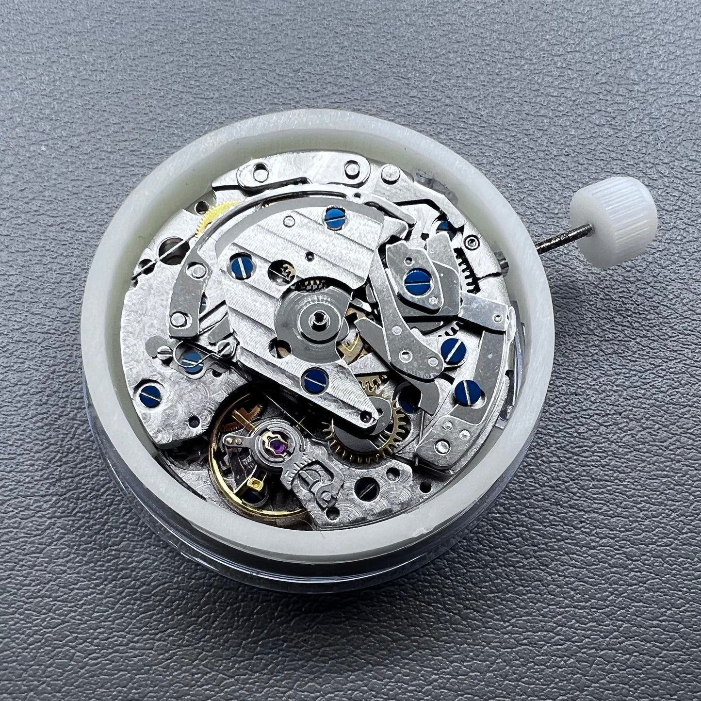 Close-up of Chinese 7750 automatic chronograph movement with day date at 3, ETA 7750 style mechanism