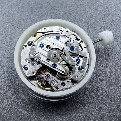 Close-up of Chinese 7750 automatic chronograph movement with day date at 3, ETA 7750 style mechanism