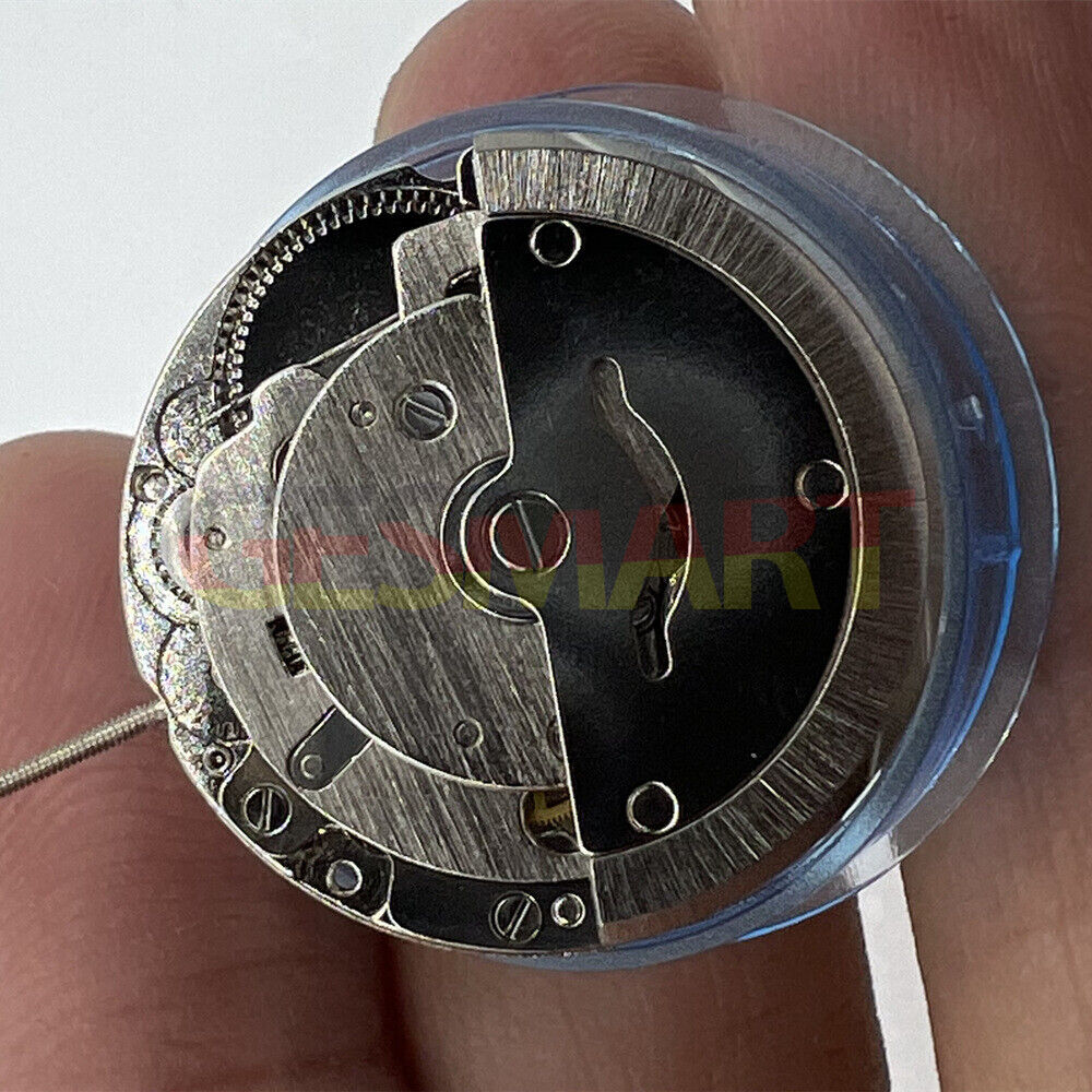 Tian Jing DG2813 silver automatic mechanical watch movement with day-date display mechanism.