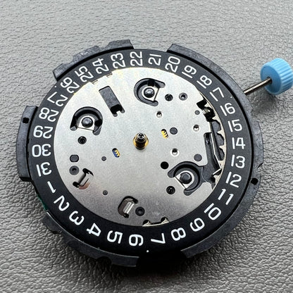 Swiss ETA G10.212 quartz watch movement with date at 4, large hands, small seconds, and black disk by ETA.