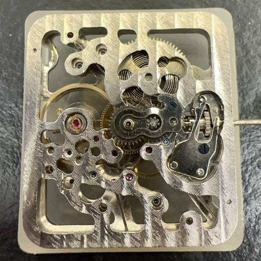 China Made Shanghai 7120 watch part with hollow automatic mechanical movement for precise timekeeping.