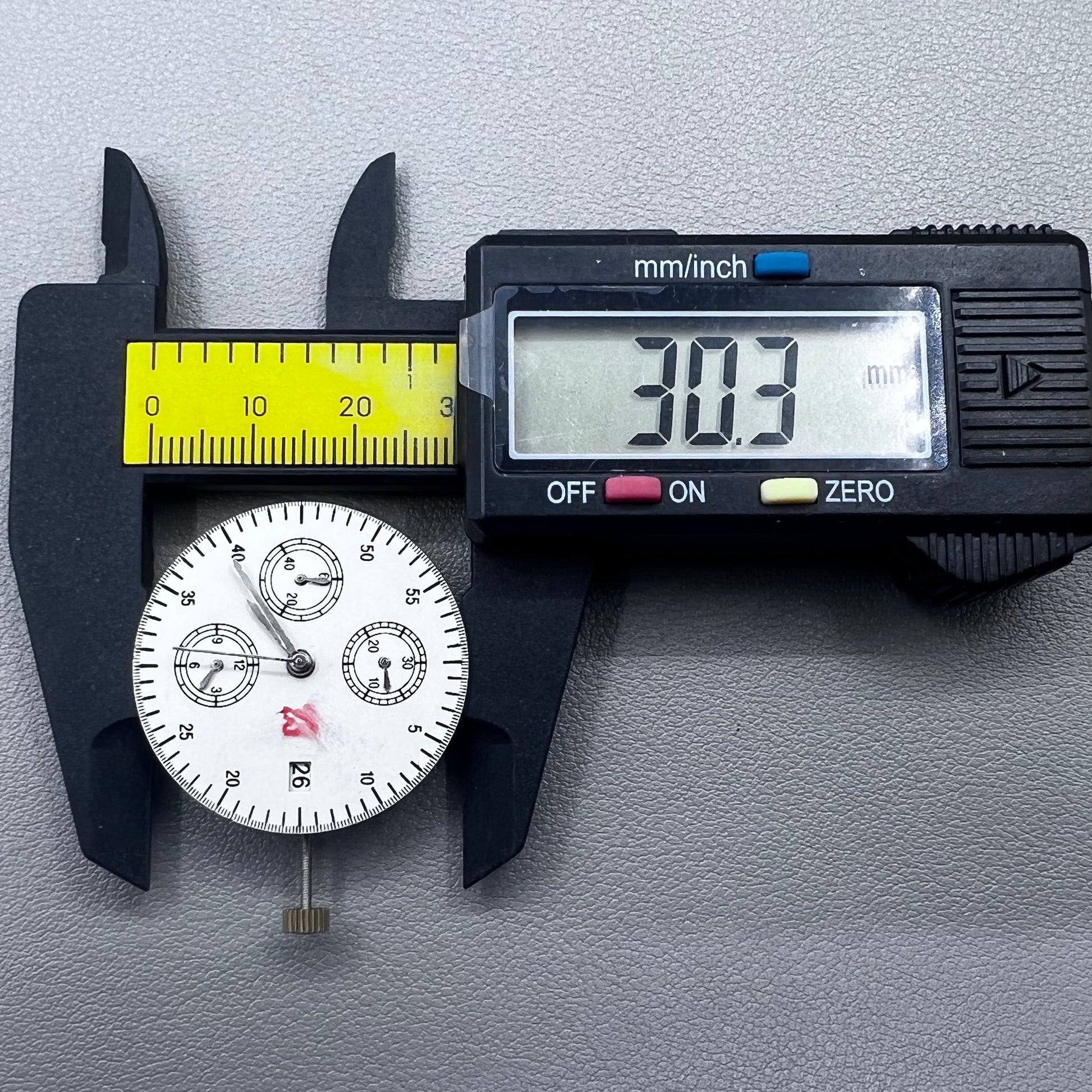 Shanghai 7750 mechanical watch movement with single calendar and small second at 9 o'clock, precision timekeeping.