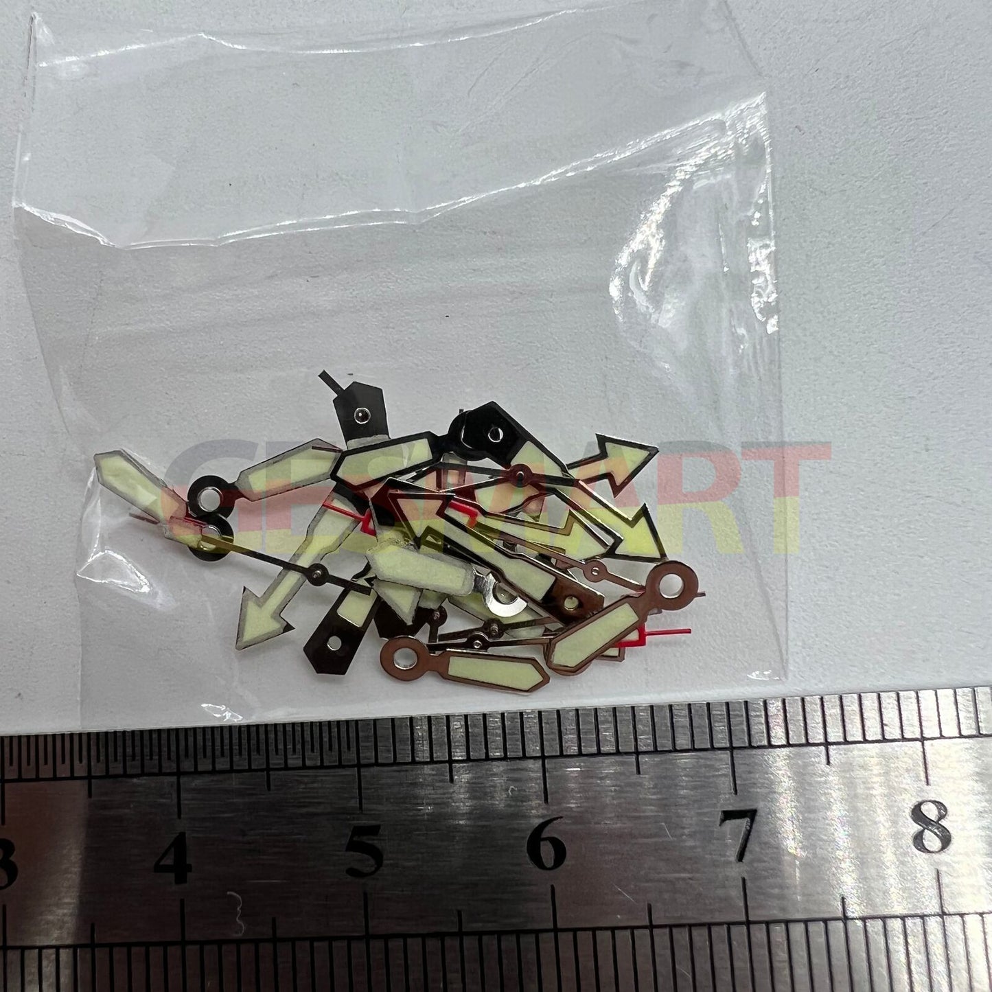 Silver arrow-shaped watch hand with green lume, compatible with Miyota 2035, 2115, 2105, 2305 movements.