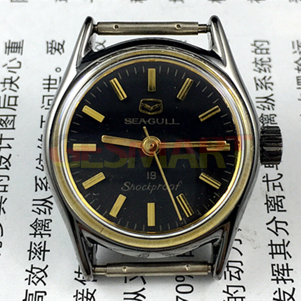 Seagull black case ladies watch with golden nail markers, shock-resistant manual mechanical movement design.