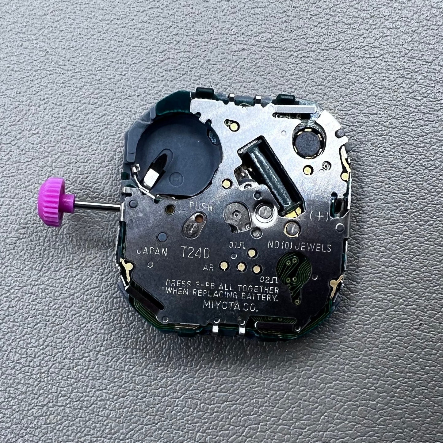 Japan T240 quartz watch movement with 3 hands and digital display, perfect for precise timekeeping accessories.