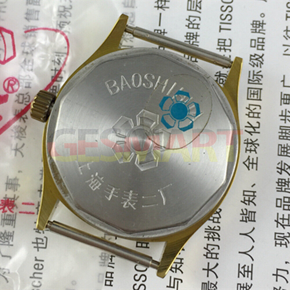 33mm Shanghai manual watch with white dial, golden nail markers, single calendar, elegant design.
