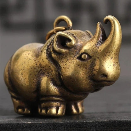 Hand-carved vintage bronze Copper rhinoceros figurine, collectible decor for display shelves.
