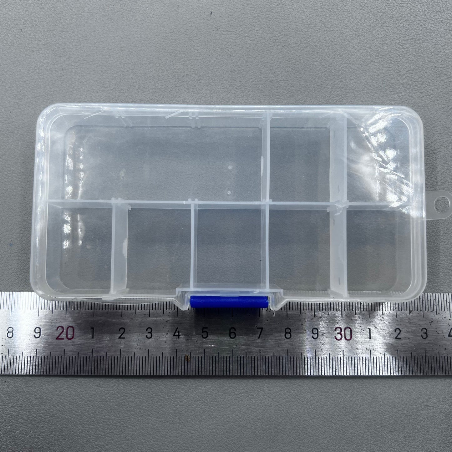 Set of 5 transparent rectangular plastic boxes, ideal for organizing watch parts securely.
