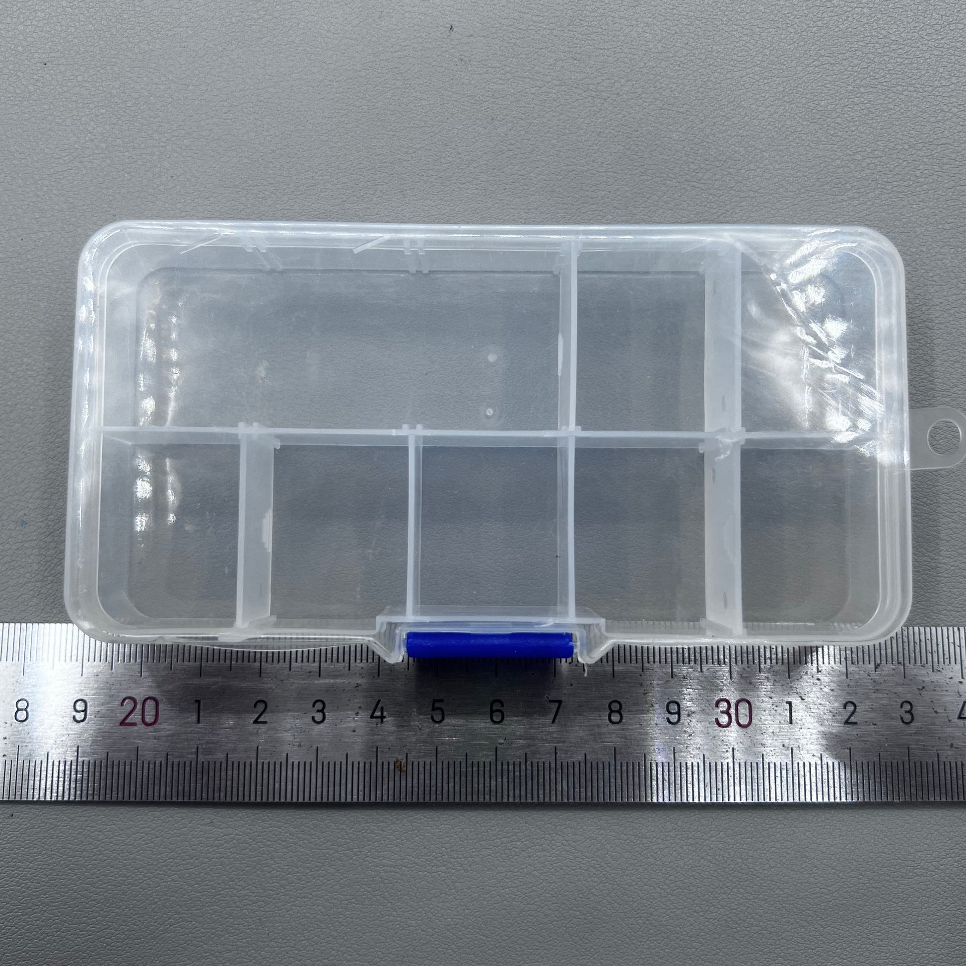 Set of 5 transparent rectangular plastic boxes, ideal for organizing watch parts securely.