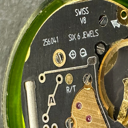 Swiss Made ETA256.041 quartz watch movement with black dial, date at 6, perfect for repairs and replacements.
