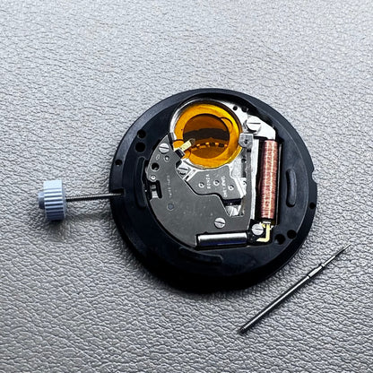 Swiss Ronda 715 quartz watch movement with date display at 3 o'clock, precision timing for accessories.