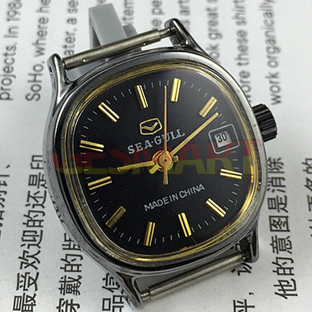 26mm Seagull black case lady watch with golden nails, manual mechanical movement, and single calendar display.