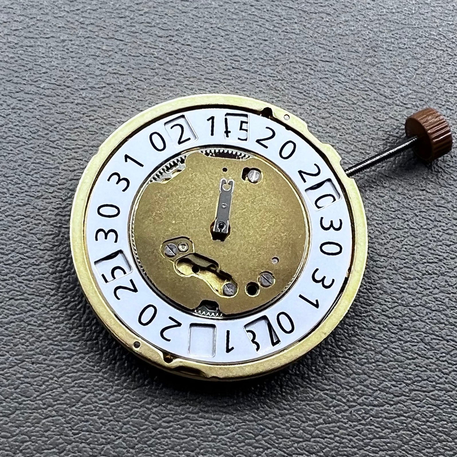 Swiss Ronda 6003B Quartz watch movement with 4 jewels and golden finish for precise timekeeping