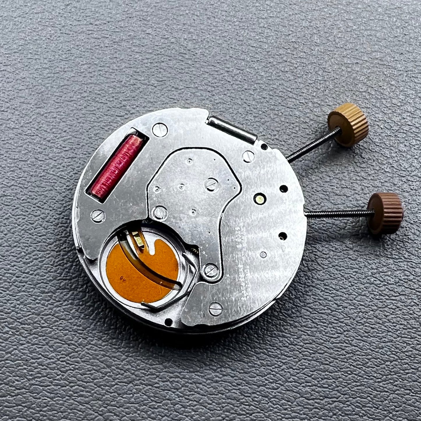 Swiss Ronda 6203B quartz movement with black disk for precise watch functionality by Ronda.