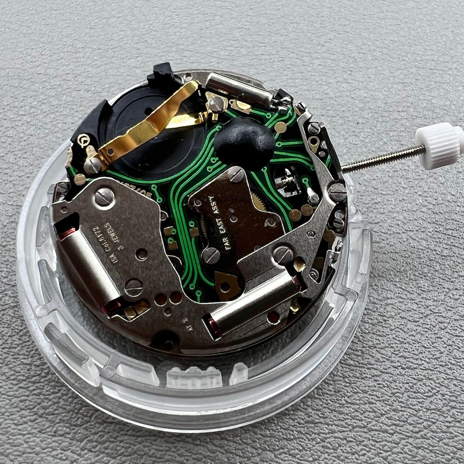 Swiss ISA 8172 Date@6 quartz watch movement replacement by ISA, precise timekeeping for watch repairs.