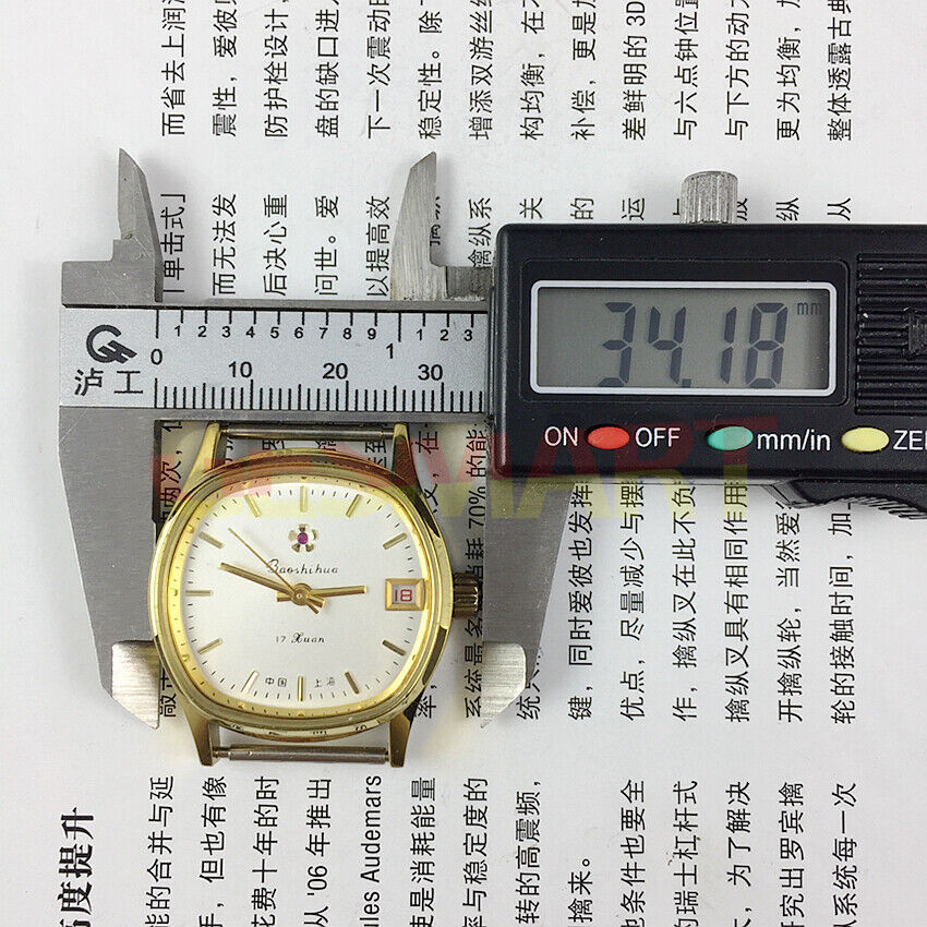 33mm Shanghai manual watch with white dial, golden nail markers, single calendar, elegant design.