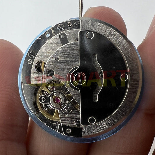 Tian Jing DG2813 watch movement showcasing silver automatic mechanical day and date display.