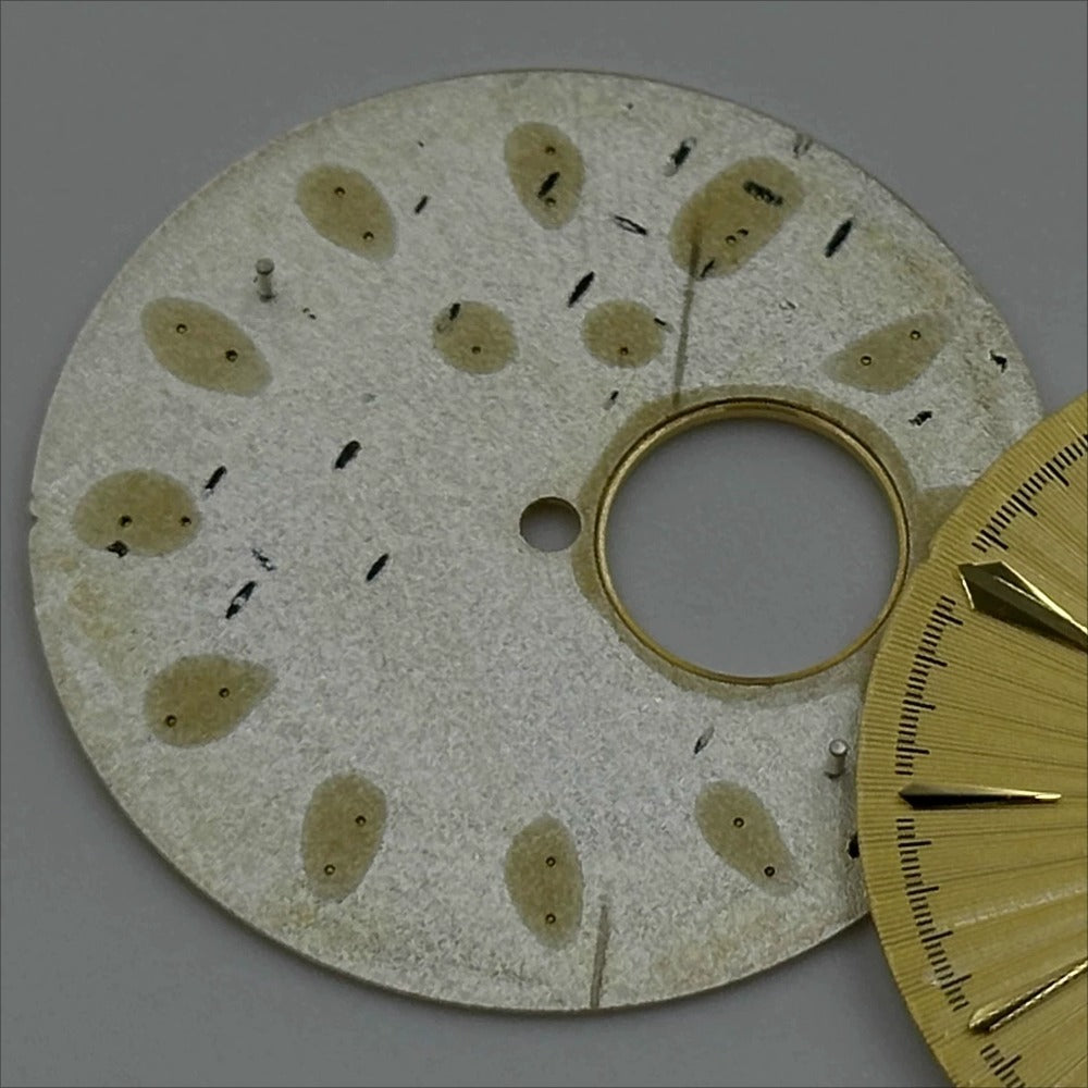 Golden 35mm cocktail watch dial with NH39 movement cutout, classic design by Modified brand.
