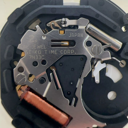 Original Japan Made 7N33C quartz watch part with day-date display, three hands movement for precise timekeeping.