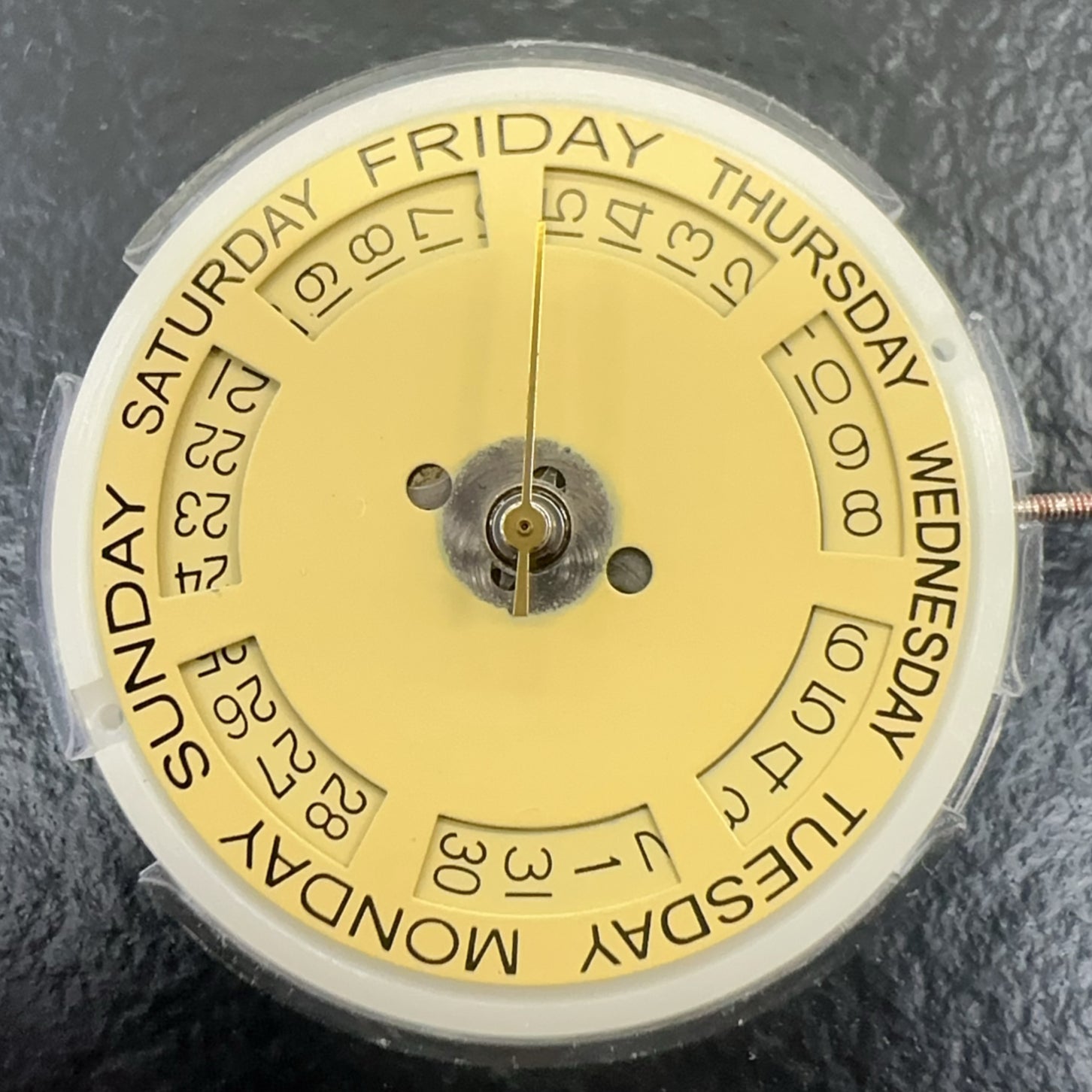 Tianjin ST16 T16 gold disk watch with automatic mechanical movement and double calendar feature.