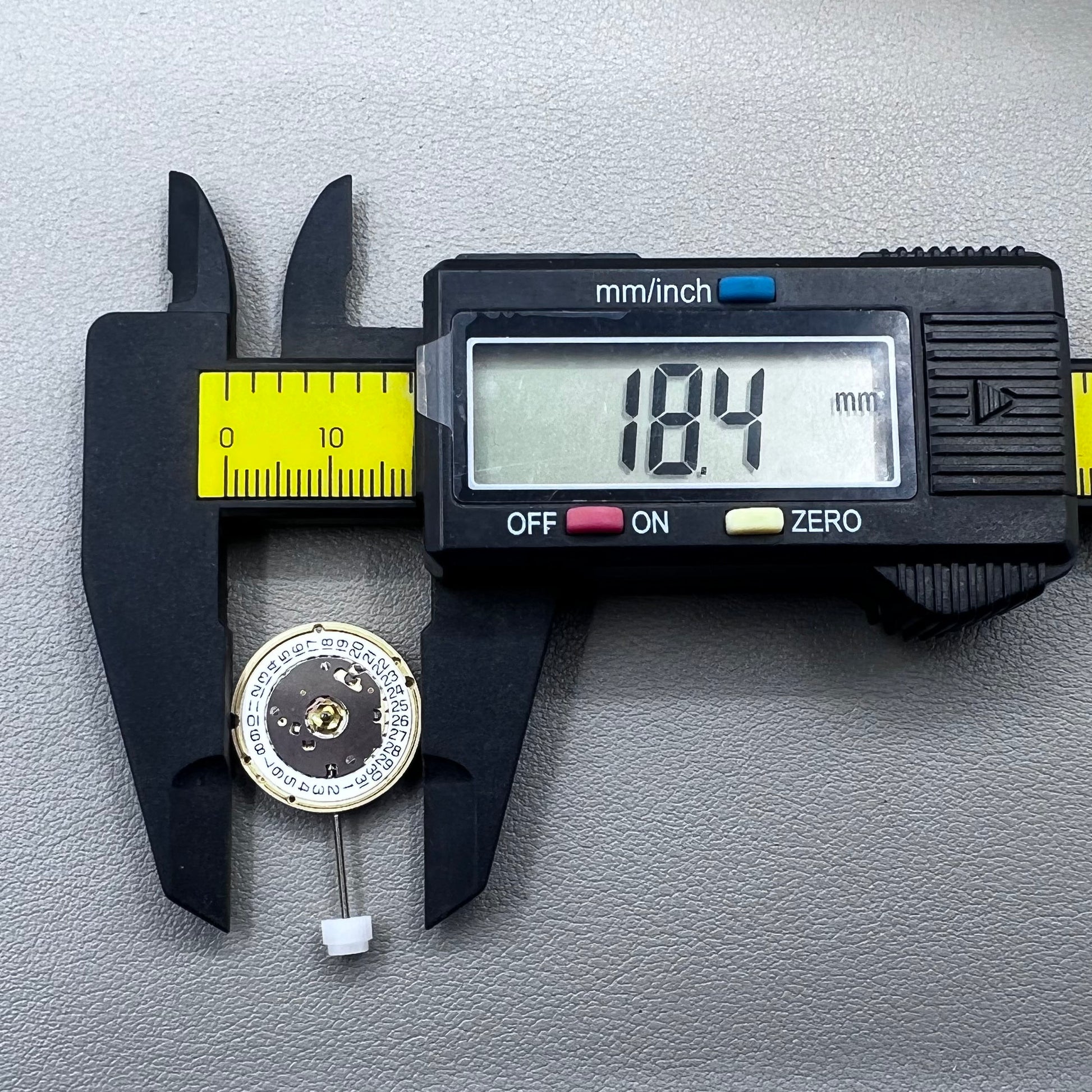 Swiss ETA E61.111 quartz watch movement with date at 3, replacement for 256.111 models, precision timing.