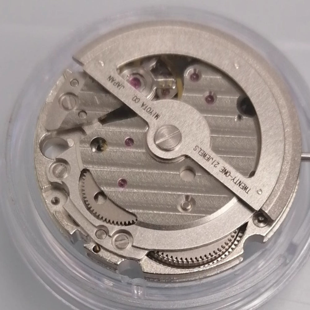 White dial watch accessory featuring Japan-made Miyota 8217 automatic mechanical movement for precise timekeeping.
