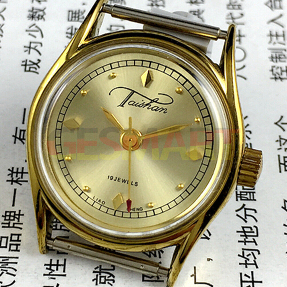 Liaocheng TAISHAN manual mechanical lady watch with 19 jewels, golden nail markers, and elegant golden case.