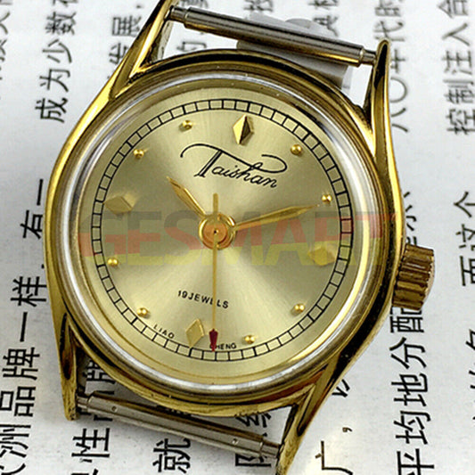 Liaocheng TAISHAN manual mechanical lady watch with 19 jewels, golden nail markers, and elegant golden case.