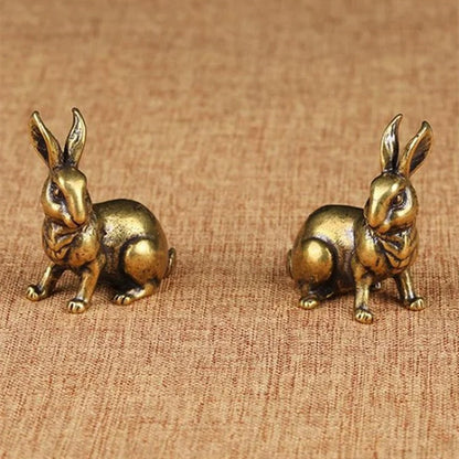 Set of 2 vintage solid copper rabbit figurines, hand-carved bronze trinkets for decor - unique collectibles.