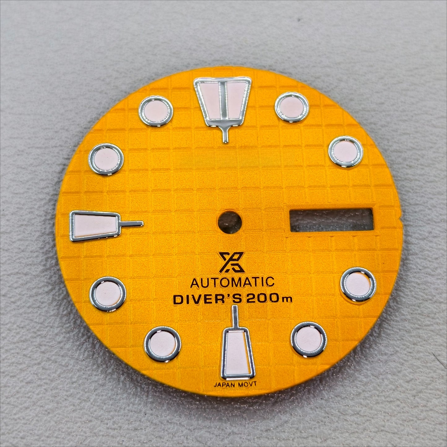 watch dial with S logo