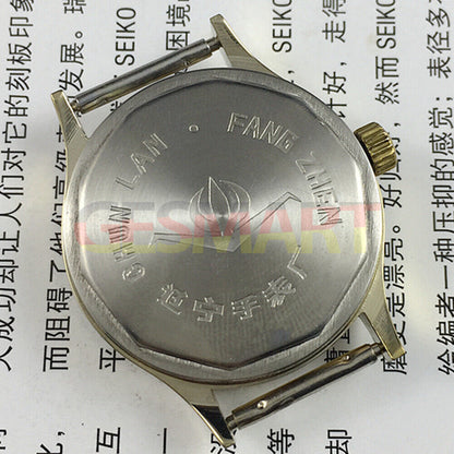 32mm manual mechanical watch with 17 jewels, yellow dial, and green lume hands for precise timekeeping.