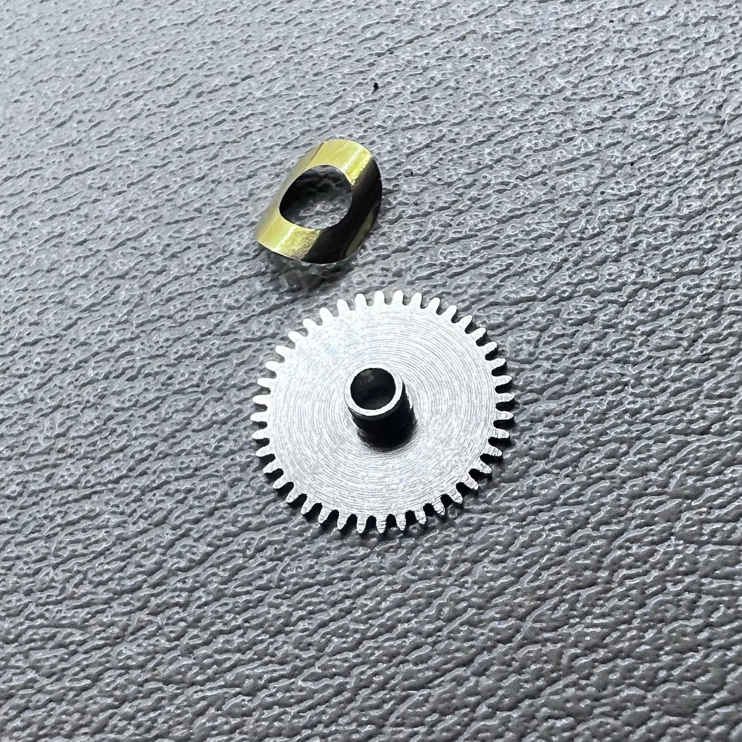 Set of 3 train bridge and hour wheel components for Seagull ST3600 and ETA6497 watch movements.