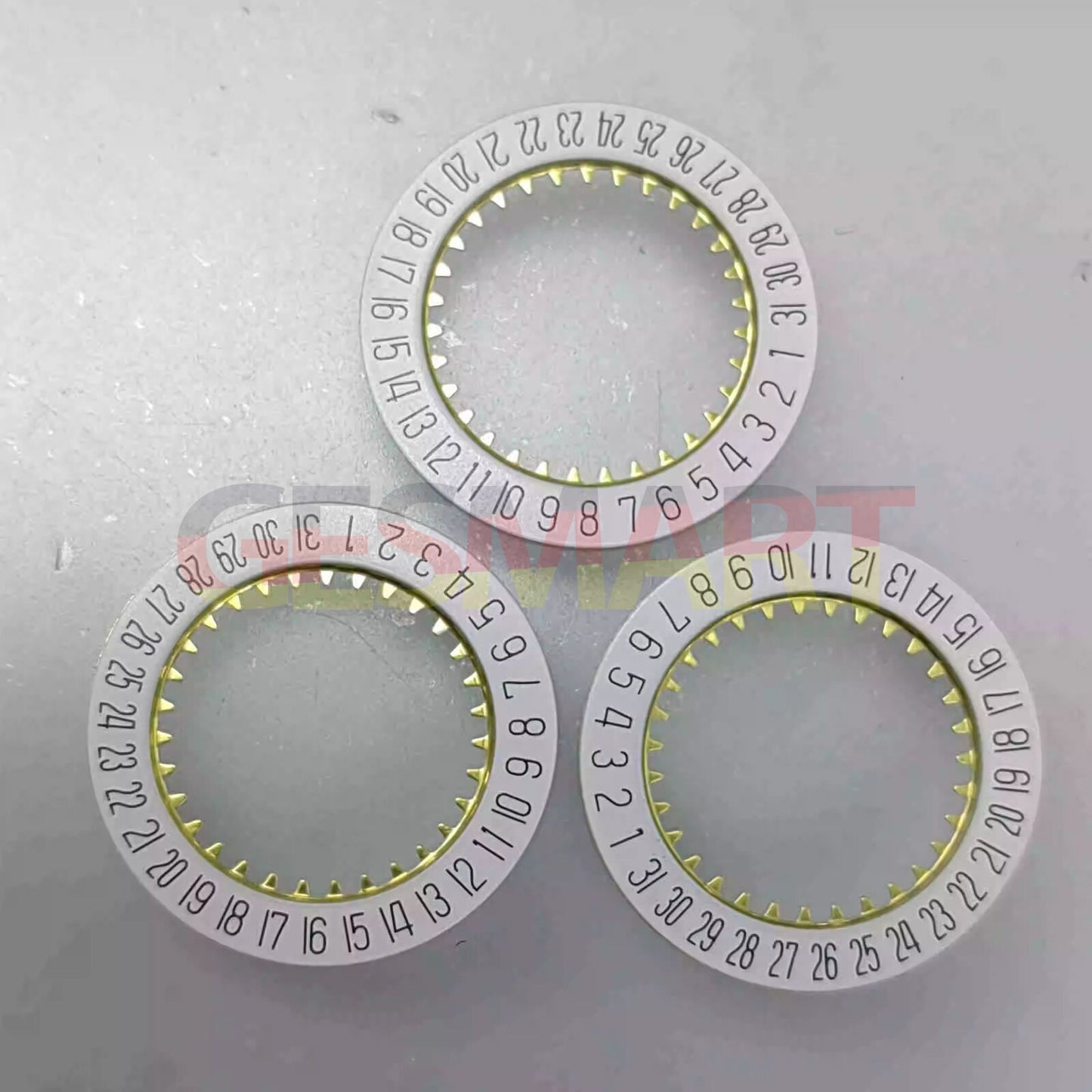 White date disk wheel showing date at 6 o'clock for Ronda 585 Quartz watch movement.