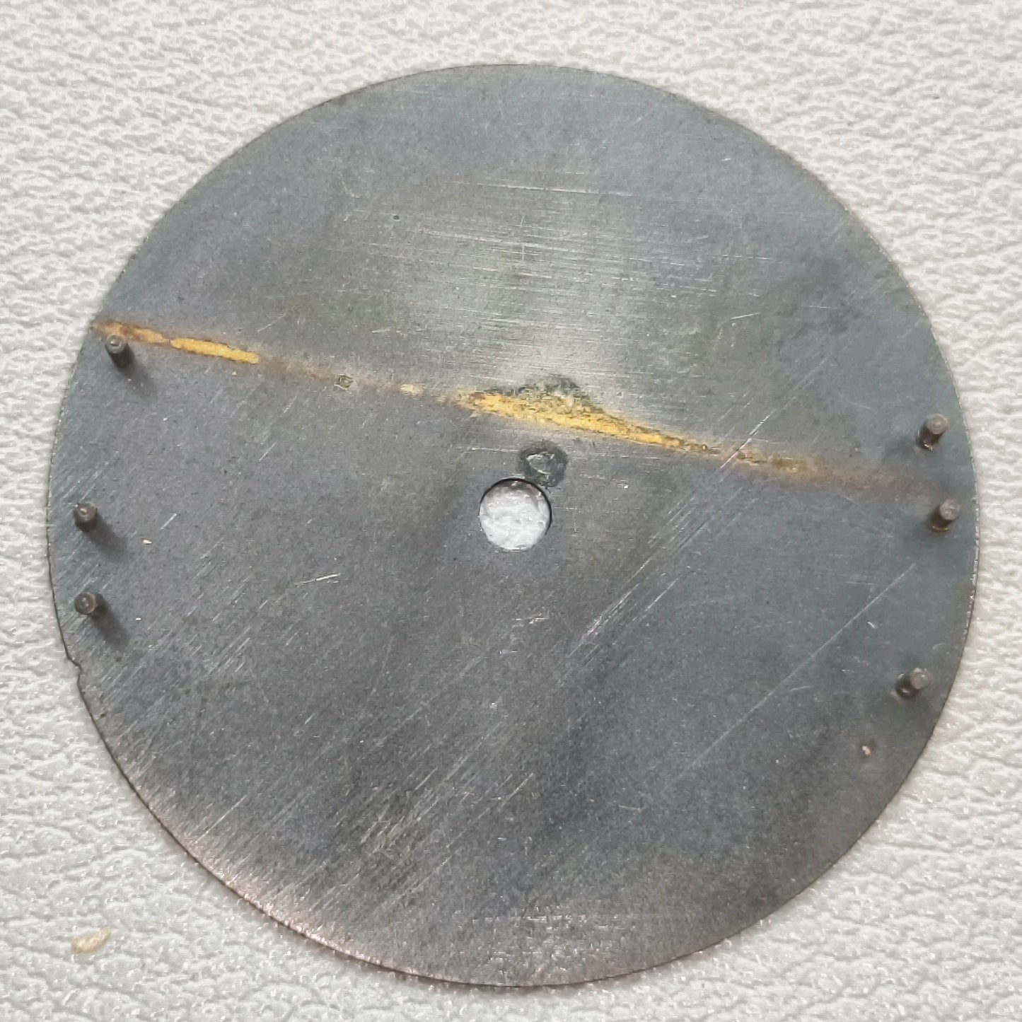 watch dial with S logo