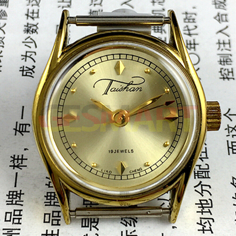 Liaocheng TAISHAN manual mechanical lady watch with 19 jewels, golden nail markers, and elegant golden case.