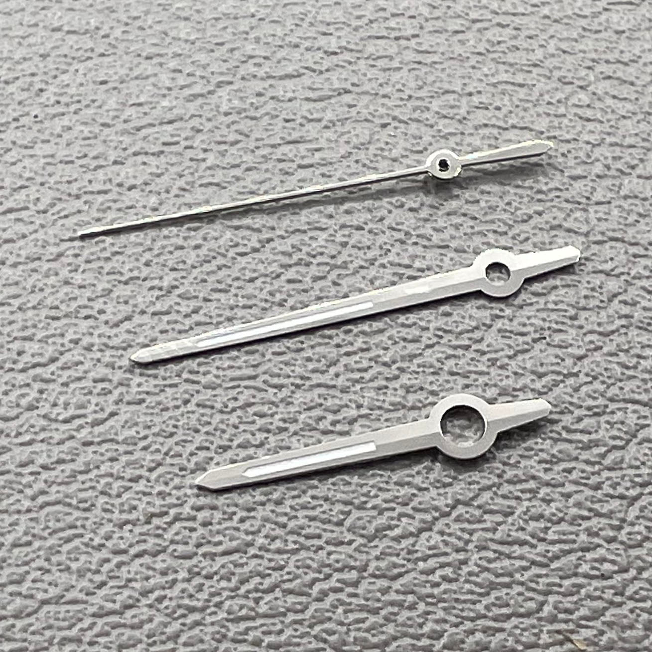 Silver trim watch hands with green luminous tips for ETA 2892, 2846, 2836, 2824 movements.