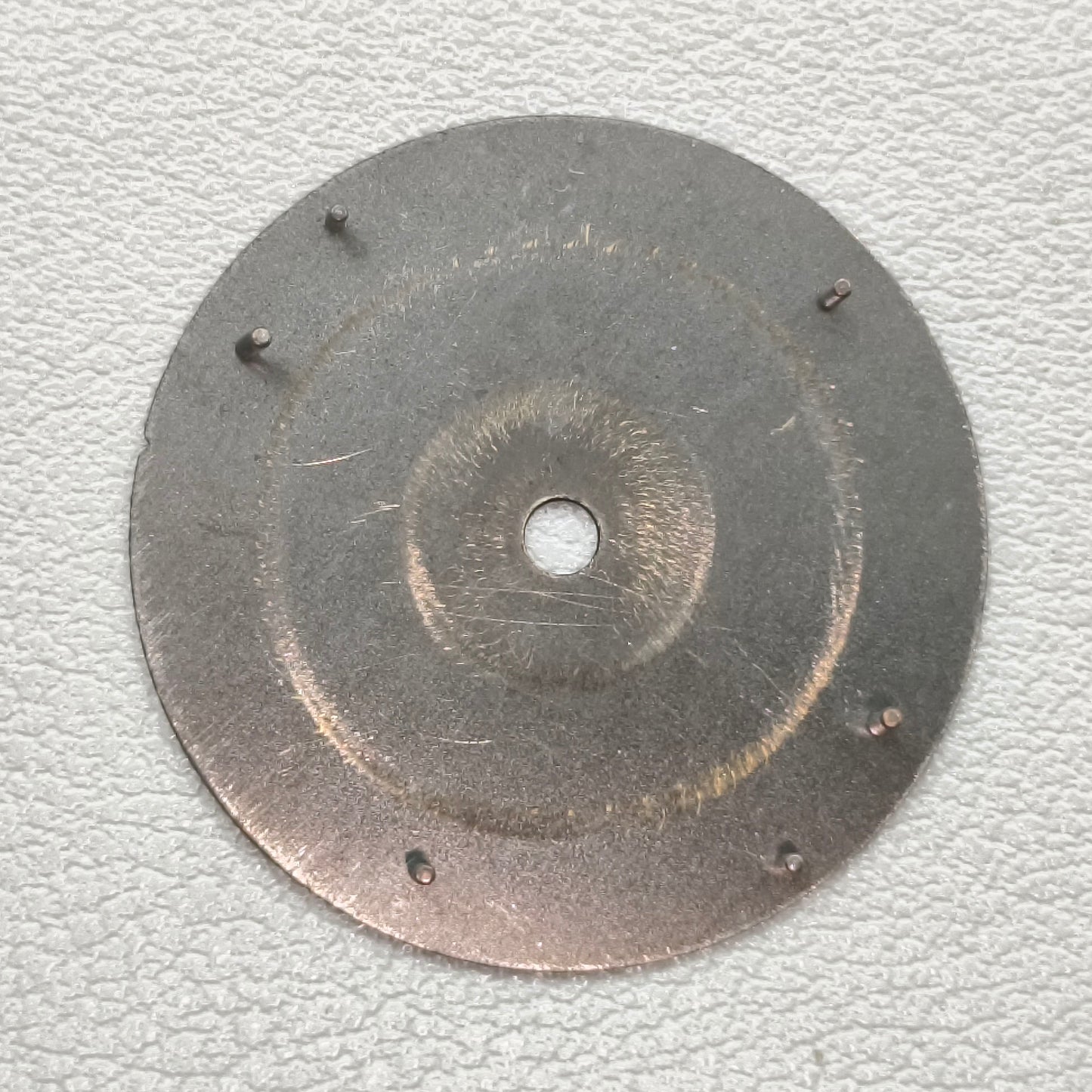 watch dial with R logo